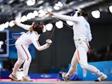 Corinna Lawrence of Great Britain (L) and Amalia Tataran of Romania compete in the Women's Fencing Individual Epee Round of 32 match during day eleven of the Baku 2015 European Games at the Crystal Hall on June 23, 2015