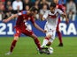 Czech Matej Hybs (L) and Germany's Armin Younes fight for a ball during the EURO U21 2015 group A match between Czech Republic and Germany at Eden Arena on June 23, 2015