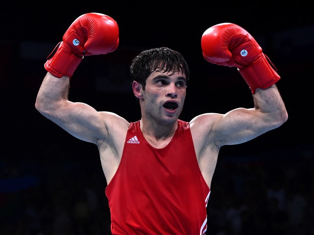 Elvin Mamishzada of Azerbaijan celebrates victory over Vincenzo Picardi of Italy in the Men's Boxing Flyweight (52kg) Final during day fourteen of the Baku 2015 European Games at Crystal Hall on June 26, 2015