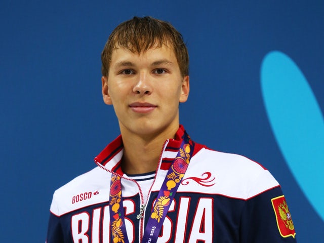 Silver medalist Ernest Maksumov of Russia stands on the podium during the medal ceremony for the Men's 1500m Freestyle fastest heat final during day twelve of the Baku 2015 European Games at the Baku Aquatics Centre on June 24, 2015