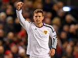 Fabian Frei of FC Basel celebrates after scoring the opening goal during the UEFA Champions League group B match between Liverpool and FC Basel 1893 at Anfield on December 9, 2014