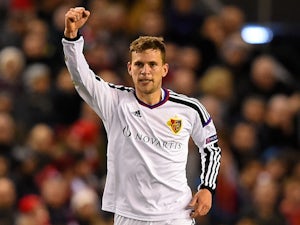 Fabian Frei of FC Basel celebrates after scoring the opening goal during the UEFA Champions League group B match between Liverpool and FC Basel 1893 at Anfield on December 9, 2014