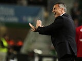Elche's coach Fran Escriba gestures from the sidelines during the Spanish league football match Elche FC vs Valencia CF at the Martinez Valero stadium in Elche on March 20, 2015