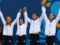 Team GB swimmers Georgia Coates, Amelia Clynes, Charlie Attwood and Luke Greenbank celebrate claiming silver in the mixed 4x100m medley at the European Games on June 26, 2015