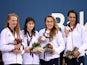 Bronze medalists Georgia Coates, Hannah Featherstone, Madeleine Crompton and Darcy Deakin of Great Britain pose on the medal podium for the Women's Swimming 4 x 100m Freestyle Relay during day eleven of the Baku 2015 European Games at the Baku Aquatics Ce
