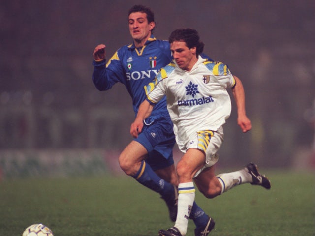 Gianfranco Zola of Parma holds off the challenge of Ciro Ferrara of Juventus during the Serie a league match between Parma and Juventus which was played at the Luigi Ferraris stadium, Parma