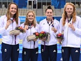 Team GB's women's 4x100m medley relay team - Rebecca Sherwin, Amelia Clynes, Layla Black and Georgia Coates - pose with their bronze medals at the European Games on June 25, 2015