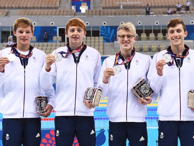 Team GB's men's 4x200m relay team pose with their silver medals at the European Games on June 25, 2015