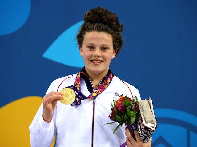 Holly Hibbott poses with her gold medal after winning the women's 800m freestyle for Great Britain at the European Games on June 23, 2015