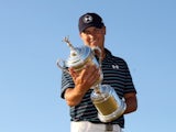 Jordan Spieth poses with the US Open trophy after winning at Chambers Bay on June 21, 2015
