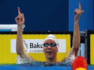 Mrozinski wins gold in 200m butterfly 