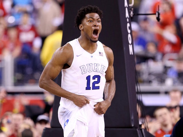 Justise Winslow #12 of the Duke Blue Devils reacts after a play in the second half against the Wisconsin Badgers during the NCAA Men's Final Four National Championship at Lucas Oil Stadium on April 6, 2015