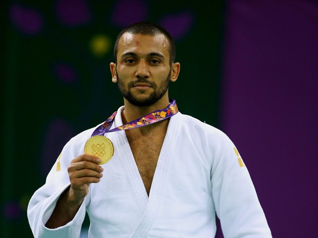 Gold medalist Kamal Khan-Magomedov of Russia poses on the medal podium following the Men's Judo -66kg Finals during day thirteen of the Baku 2015 European Games at the Heydar Aliyev Arena on June 25, 2015
