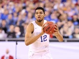 Karl-Anthony Towns #12 of the Kentucky Wildcats handles the ball in the second half against the Wisconsin Badgers during the NCAA Men's Final Four Semifinal at Lucas Oil Stadium on April 4, 2015