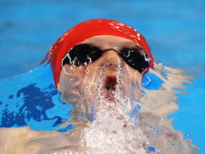 Greenbank wins gold in 100m backstroke