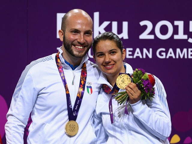 Gold medalists Niccolo Campriani and Petra Zublasing of Italy pose with the medals won during the Shooting Mixed Team 10m Air Rifle finals on day ten of the Baku 2015 European Games at the Baku Shooting Centre on June 22, 2015