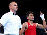 Team GB boxer Qais Ashfaq celebrates after beating Giorgi Gocatishvili of Georgia at the European Games on June 17, 2015 