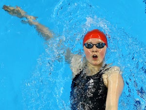 Team GB's Sherwin makes backstroke semis