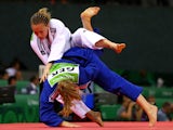 Sally Conway of Great Britain (white) and Szaundra Diedrich of Germany (blue) compete in the Women's Judo -70kg Quarter Final during day fourteen of the Baku 2015 European Games at the Heydar Aliyev Arena on June 26, 2015