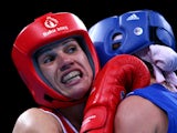 Stanimira Petrova of Bulgaria (red) and Anna Alimardanova of Azerbaijan (blue) compete in the Women's Boxing Bantamweight (51-54kg) Quarter Final during day eleven of the Baku 2015 European Games at the Crystal Hall on June 23, 2015