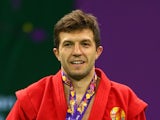 Stsiapan Papou of Belarus poses with his gold medal won in the Men's Sambo -74kg Final during day ten of the Baku 2015 European Games at the Heydar Aliyev Arena on June 22, 2015