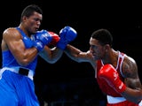 Tony Yoka of France (red) and Joe Joyce of Great Britian (blue) compete in the Men's Super Heavyweight +91kg semi final bout during day thirteen of the Baku 2015 European Games at the Crystal Hall on June 25, 2015