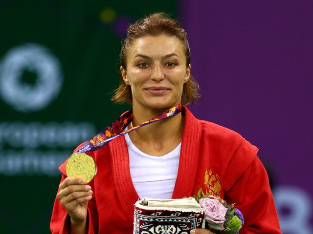 Yana Kostenko of Russia poses with her gold medal from the Women's Sambo -60kg Final during day ten of the Baku 2015 European Games at the Heydar Aliyev Arena on June 22, 2015
