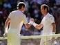Andy Murray of Great Britain shakes hands with his opponent after winning his Gentlemen's Singles first round match against Mikhail Kukushkin of Kazakhstan during day two of the Wimbledon Lawn Tennis Championships at the All England Lawn Tennis and Croque
