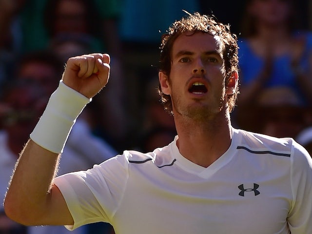 Britain's Andy Murray celebrates beating Kazakhstan's Mikhail Kukushkin during their men's singles first round match on day two of the 2015 Wimbledon Championships at The All England Tennis Club in Wimbledon, southwest London, on June 30, 2015