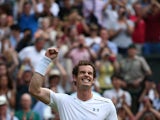 Britain's Andy Murray celebrates beating Italy's Andreas Seppi during their men's singles third round match on day six of the 2015 Wimbledon Championships at The All England Tennis Club in Wimbledon, southwest London, on July 4, 2015