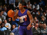 Brandon Knight #3 of the Phoenix Suns controls the ball against the Denver Nuggets at Pepsi Center on February 25, 2015