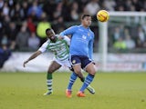 Cameron Stewart of Leeds United controls the ball ahead of Joel Grant of Yeovil Town during the Sky Bet Championship match between Yeovil Town and Leeds United at Huish Park on February 08, 2014