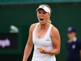 Caroline Wozniacki of Denmark reacts in her match against Denisa Allertova of Czech Republic during their Women's Singles Second Round match during day four of the Wimbledon Lawn Tennis Championships at the All England Lawn Tennis and Croquet Club on July