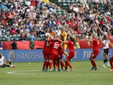 Team members from England their win over Germany during the FIFA Women's World Cup Canada 3rd Place Play-off match between England and Germany at Commonwealth Stadium on July 4, 2015