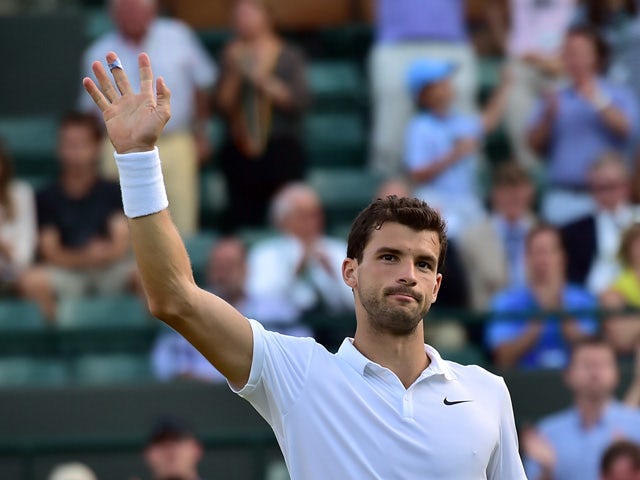 Bulgaria's Grigor Dimitrov celebrates beating Argentina's Federico Delbonis during their men's singles first round match on day one of the 2015 Wimbledon Championships at The All England Tennis Club in Wimbledon, southwest London, on June 29, 2015
