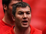 Coach, Iestyn Harris of Wales talks to his players during the Captains Run prior to Gillette Four Nations Double-Header at Wembley Stadium on November 4, 2011