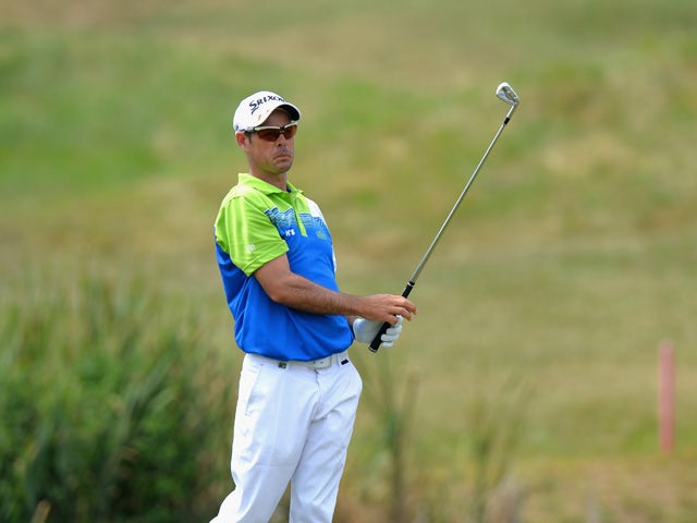 Jaco Van Zyl of South Africa plays his second shot on the 10th fairway during the Alstom Open de France - Day Three at Le Golf National on July 4, 2015