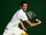 James Ward of Great Britain in Gentlemens Singles first round match against Luca Vanni of Italy during day two of Wimbledon on June 30, 2015