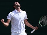 Britain's James Ward celebrates beating Czech Republic's Jiri Vesely during their men's singles second round match on day four of the 2015 Wimbledon Championships at The All England Tennis Club in Wimbledon, southwest London, on July 2, 2015