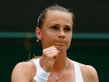 Magdalena Rybarikova of Slovakia celebrates during her match against Ekaterina Makarova of Russia in her Women's Singles Second Round match during day four of the Wimbledon Lawn Tennis Championships at the All England Lawn Tennis and Croquet Club on July 
