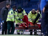 Murray Davidson of St Johnstone is stretchered off during the Scottish League Cup Quarter final between Rangers and St Johnstoneat Ibrox Stadium on October 28, 2014