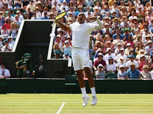 Nick Kyrgios fights back to beat Raonic