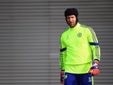 Petr Cech looks on during a Chelsea training session ahead of the UEFA Champions League Round of 16 second leg match against Paris Saint-Germain at Chelsea Training Ground on March 10, 2015