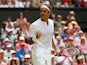 Roger Federer of Switzerland reacts during his Gentlemens Singles Second Round match against Sam Querry of the United States during day four of the Wimbledon Lawn Tennis Championships at the All England Lawn Tennis and Croquet Club on July 2, 2015