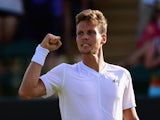 Tomas Berdych of Czech Republic celebrates winning in his Mens Singles Third Round match against Pablo Andujar of Spain during day six of the Wimbledon Lawn Tennis Championships at the All England Lawn Tennis and Croquet Club on July 4, 2015