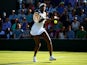 Venus Williams of the United States plays a forehand in her Ladies Singles first round match against Madison Brengle of the United States during day one of the Wimbledon Lawn Tennis Championships at the All England Lawn Tennis and Croquet Club on June 29,