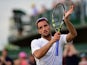 Viktor Troicki of Serbia claps the crowd during his Gentlemens Singles Second Round match against Aljaz Bedene of Great Britain during day four of the Wimbledon Lawn Tennis Championships at the All England Lawn Tennis and Croquet Club on July 2, 2015