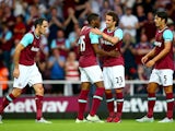 West Ham celebrate with Diafra Sakho of West Ham after he scores to make it 2-0 during the UEFA Europa League match between West Ham United and FC Lusitans at Boleyn Ground on July 2, 2015