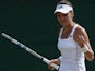 Poland's Agnieszka Radwanska celebrates beating Serbia's Jelena Jankovic during their women's singles fourth round match on day seven of the 2015 Wimbledon Championships at The All England Tennis Club in Wimbledon, southwest London, on July 6, 2015