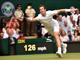Britain's Andy Murray returns against Canada's Vasek Pospisil during their men's quarter-final match on day nine of the 2015 Wimbledon Championships at The All England Tennis Club in Wimbledon, southwest London, on July 8, 2015
